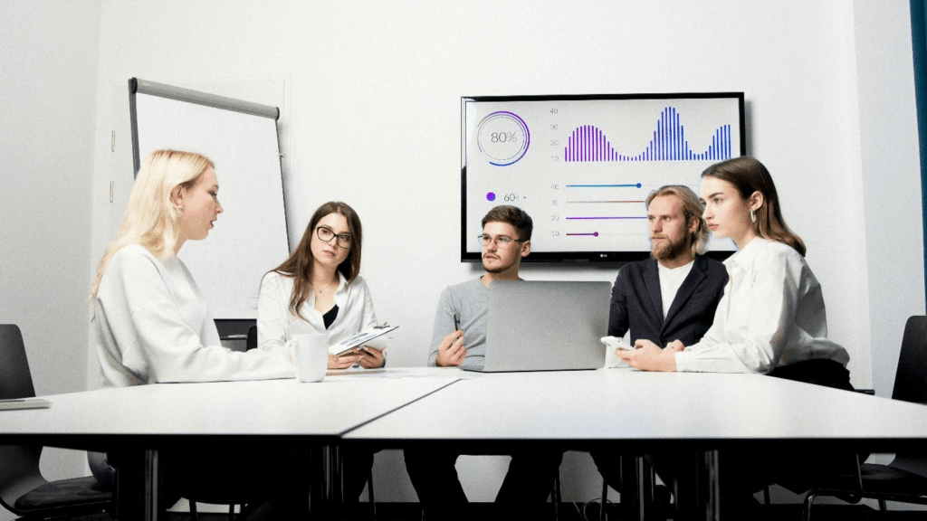 A group of people in a meeting