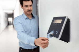 A person using a smart card attendance system